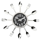 Silver fork and spoon kitchen wall clock