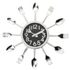 Silver fork and spoon kitchen wall clock