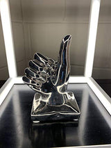 Febland silver ceramic thumbs-up hand sculpture