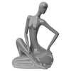 Grey ceramic sitting lady ornament