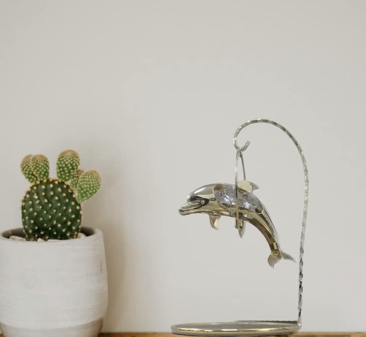 Gold-plated dolphin ornament with crystal detail and mirrored stand