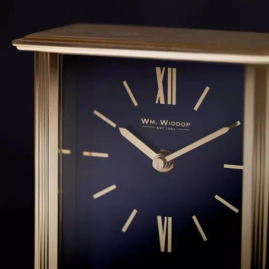 William Widdop gold mantel clock with navy blue dial