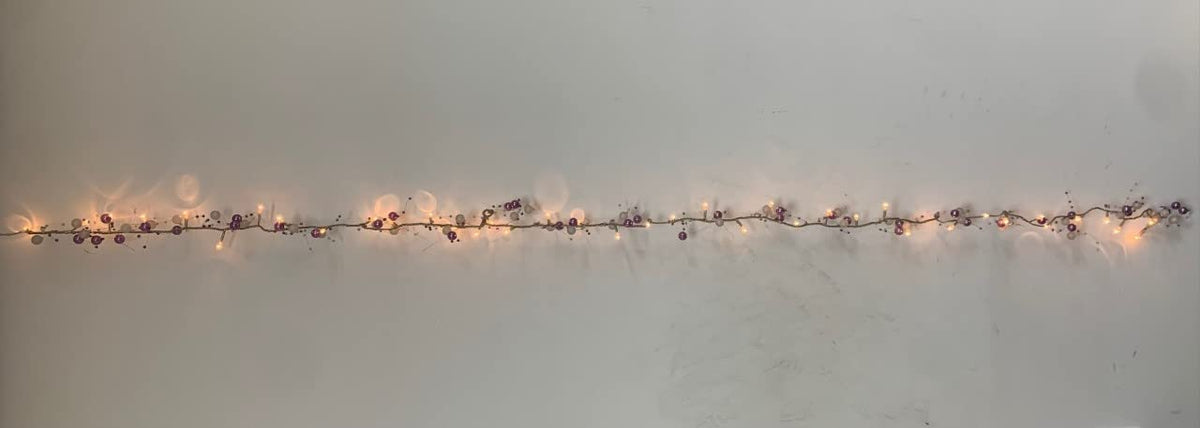 40 warm white LED rice lights with purple and white beads