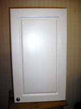 White bathroom storage cabinet with chrome-effect handle