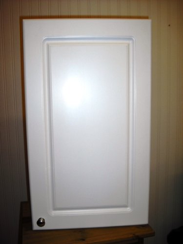White bathroom storage cabinet with chrome-effect handle