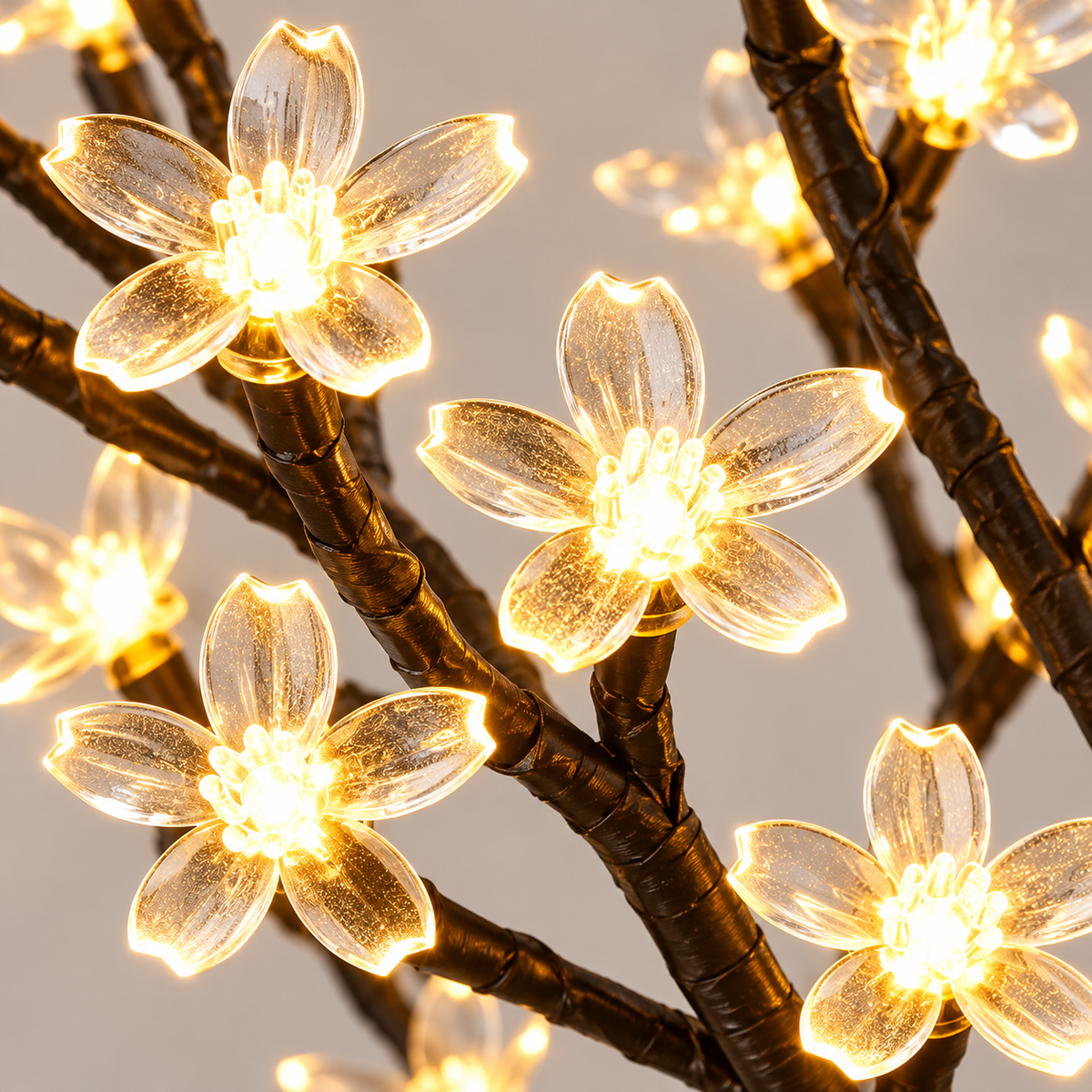 Close-up of warm white LED blossom flowers on 45cm cherry blossom tree