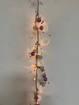 40 warm white LED rice lights with purple and white beads