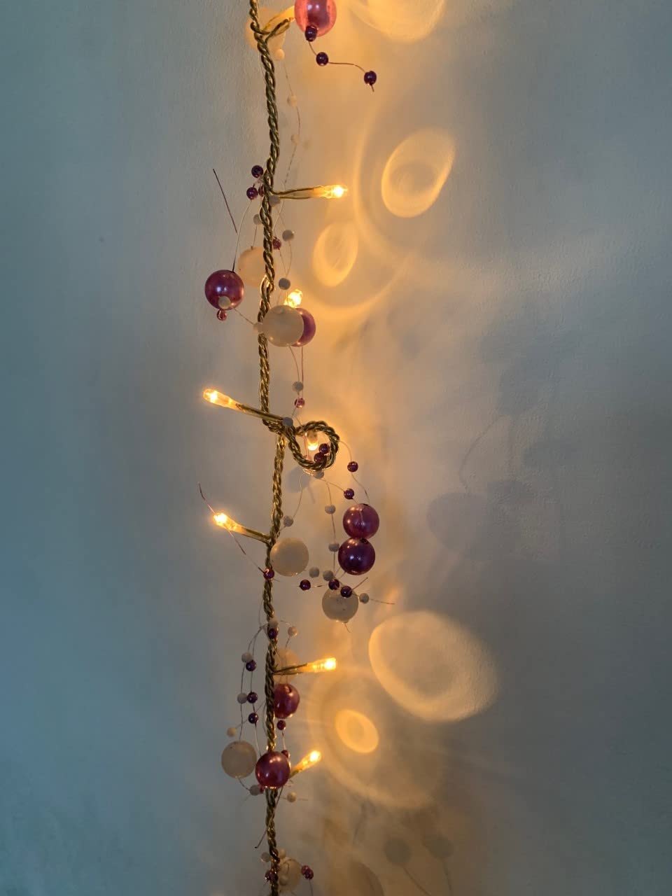 40 warm white LED rice lights with purple and white beads