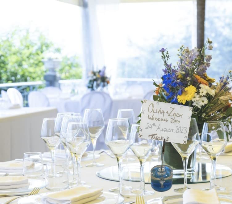 Blue dolphin place card holder for weddings and table settings