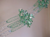 Green and silver four-section Christmas foil garland