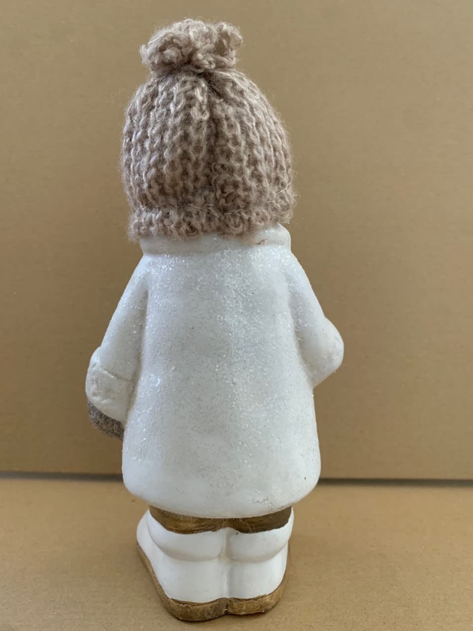 White ceramic Boy with creme coloured woolen hat