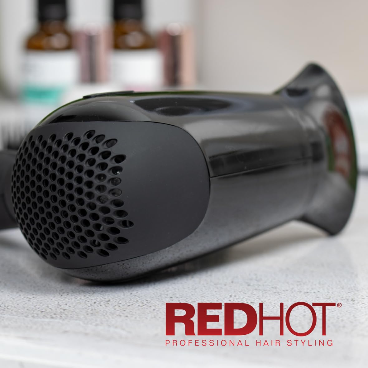 Red Hot black folding dual voltage travel hair dryer