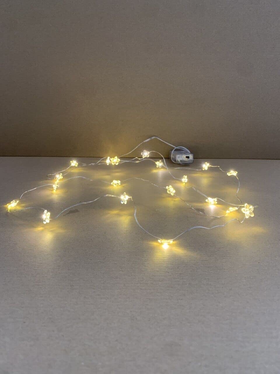 Flower-shaped warm white LEDs on flexible copper wire