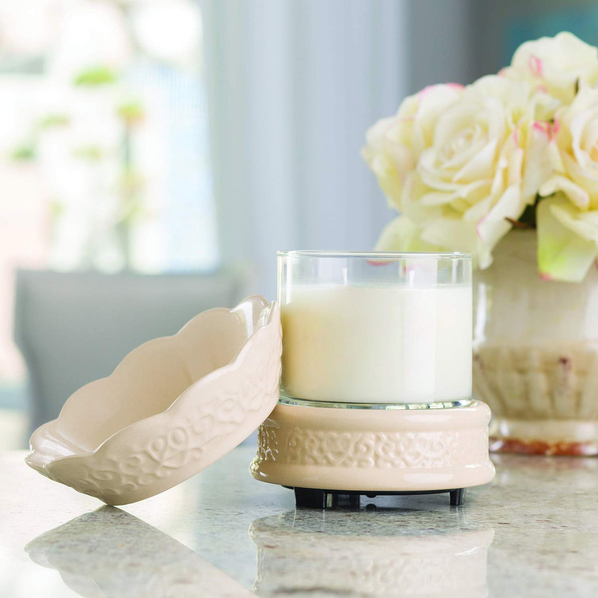 Candle Warmers Etc. cream embossed ceramic candle and wax melt warmer