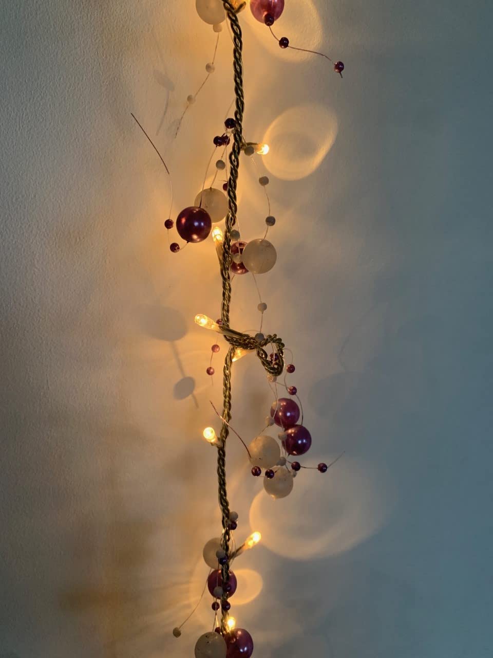 40 warm white LED rice lights with purple and white beads