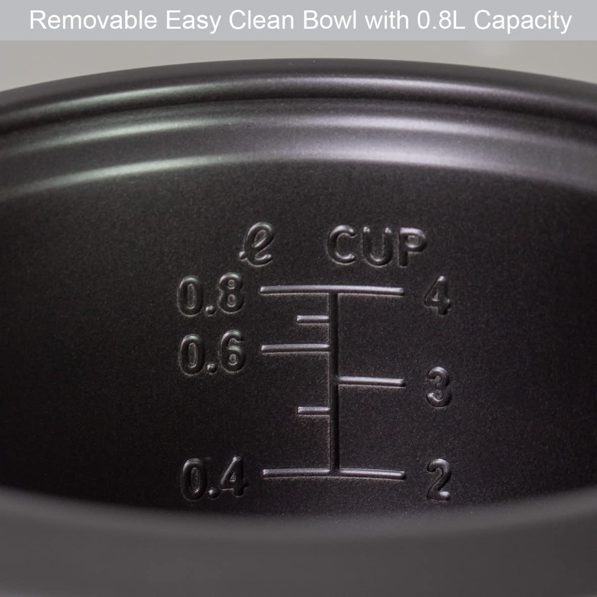 Quest rice cooker with measuring cup and serving spatula