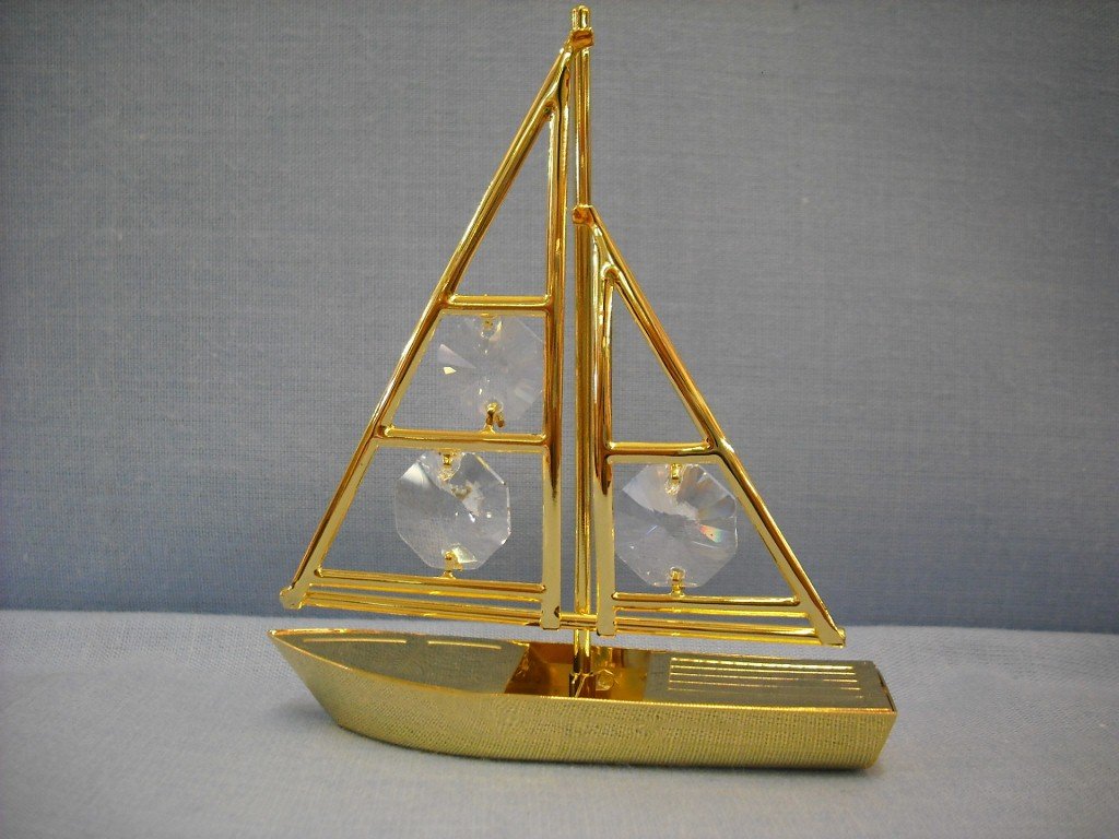 Lesser & Pavey gold-plated sailboat ornament with Swarovski crystals