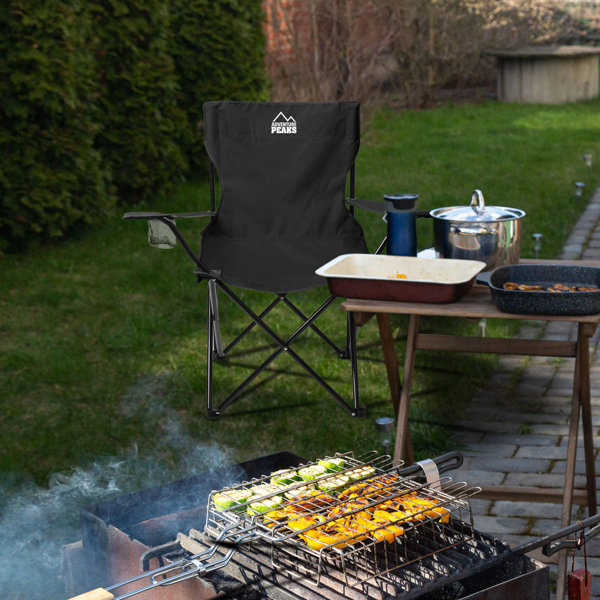 Adventure Peaks black folding camping chair with carry bag and cup holder