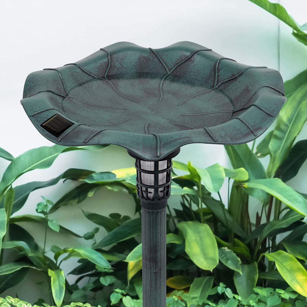 Verdigris-effect garden bird bath with two white LEDs