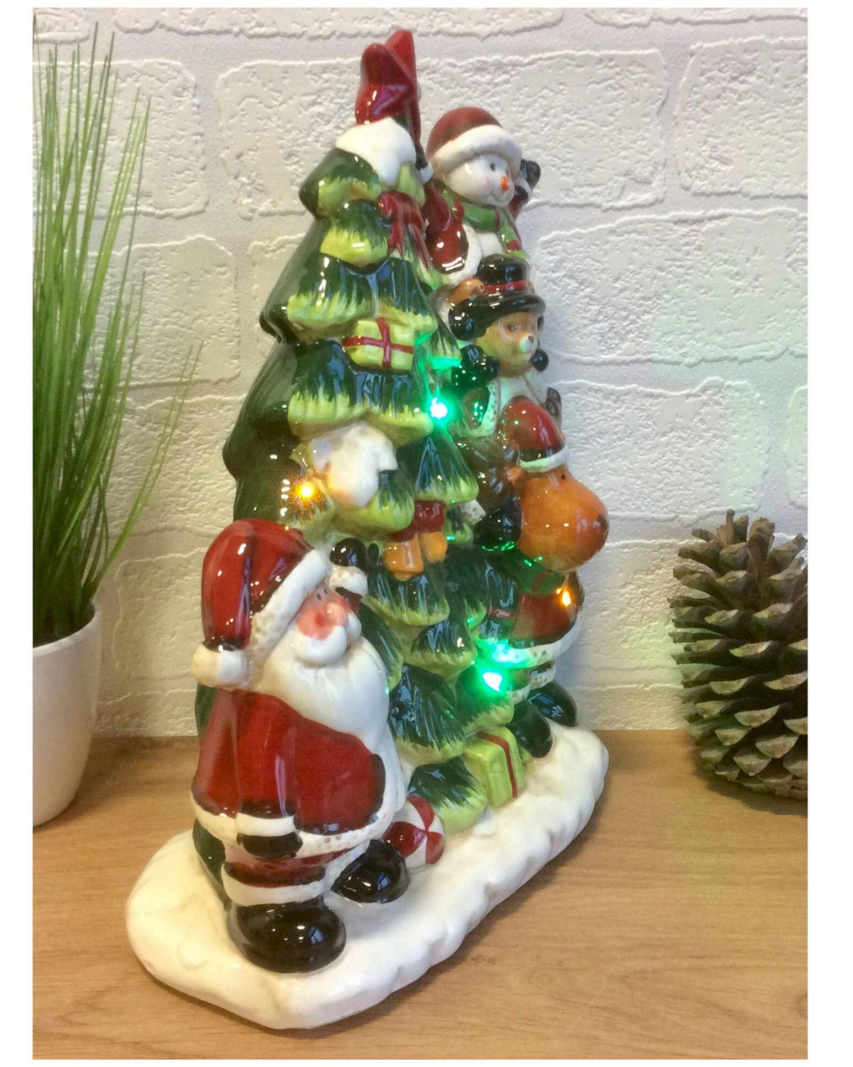 Musical light-up Santa and Christmas tree ceramic decoration