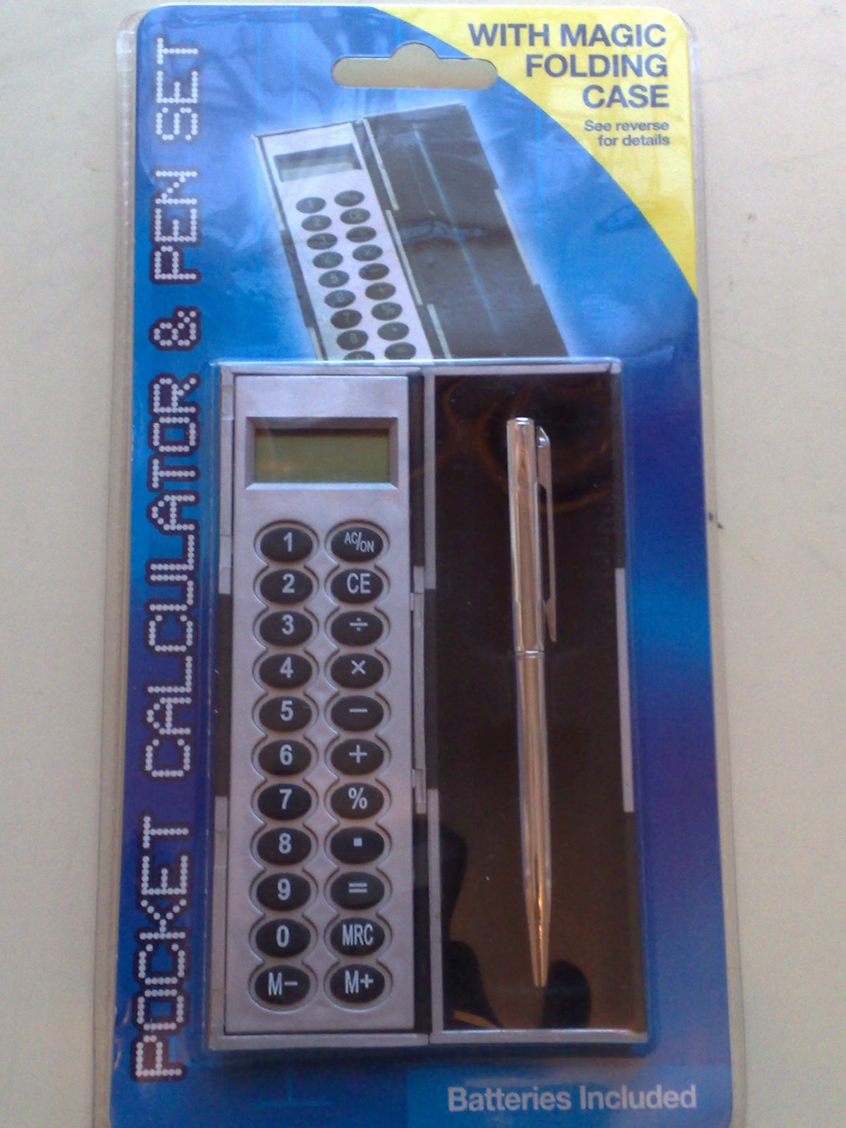 Pocket calculator and pen set with folding case