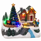Snowy animated Christmas village ornament with moving train and LED lighting