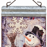Close-up of Frosty snowman metal Christmas wall hanging design