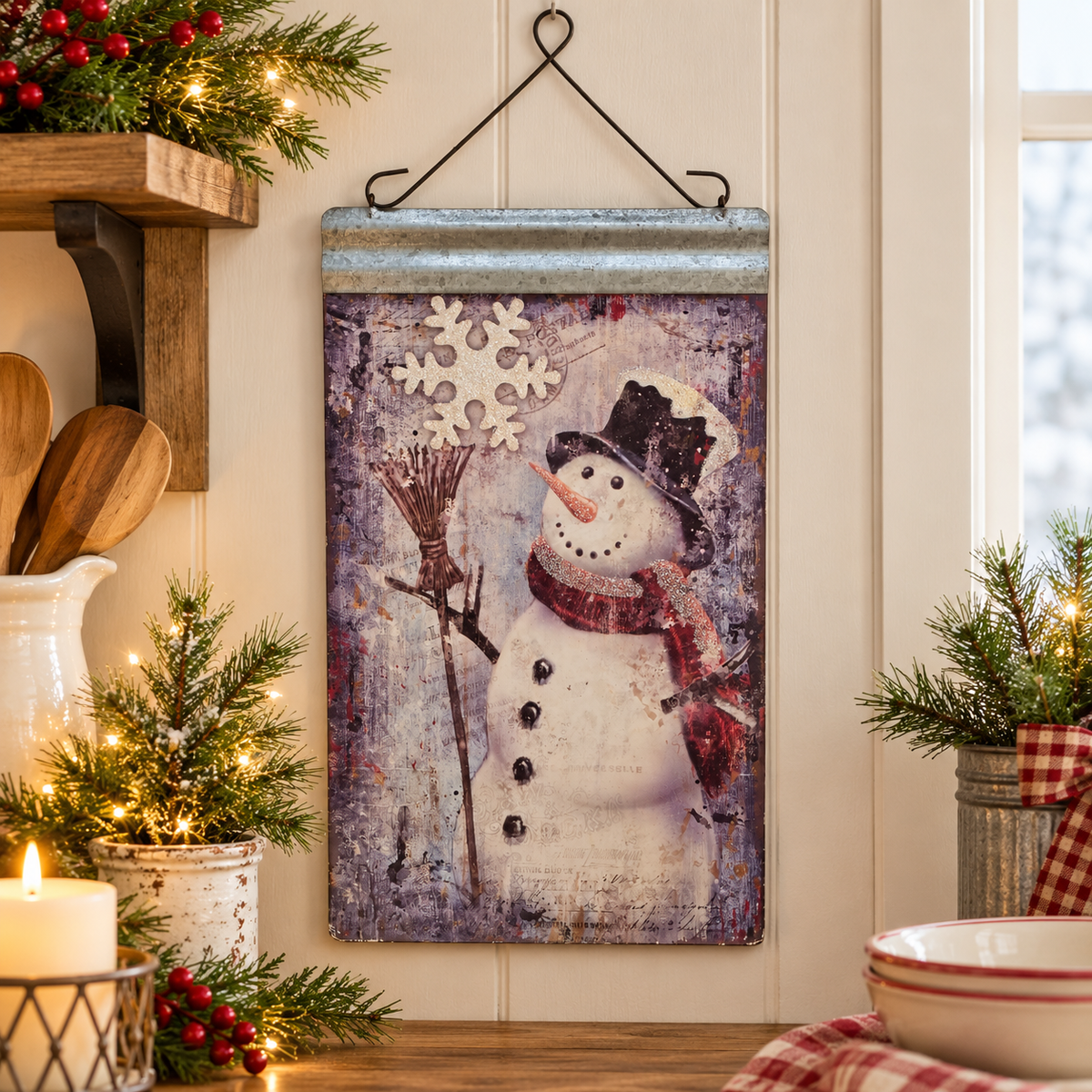 Frosty snowman metal wall hanging in a festive kitchen display