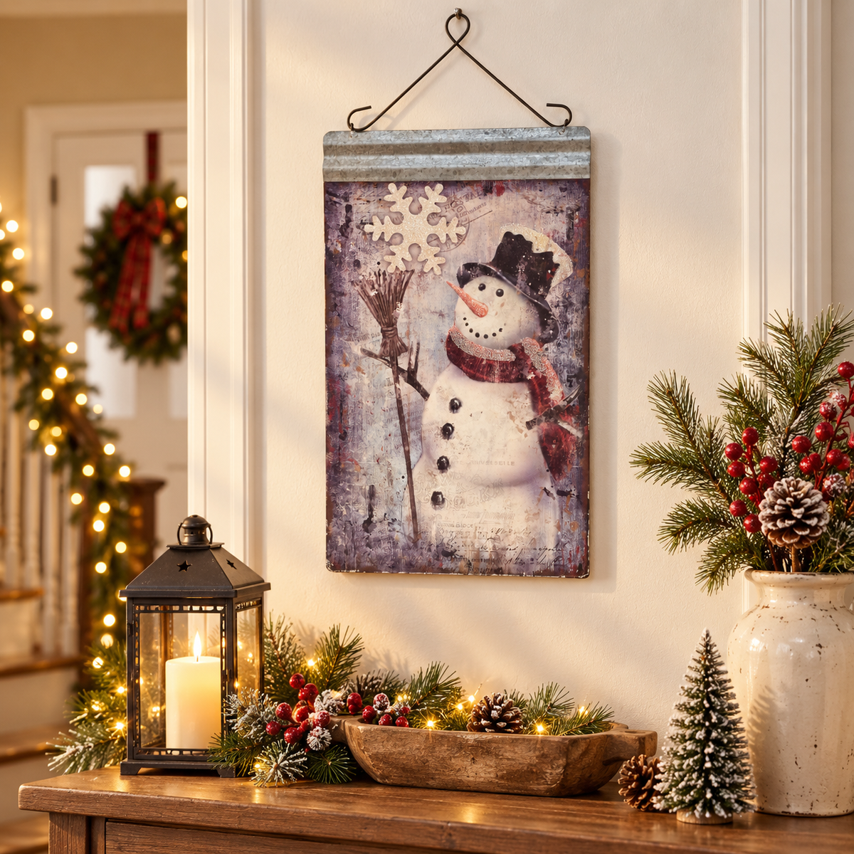 Frosty snowman metal wall hanging with lantern and Christmas greenery