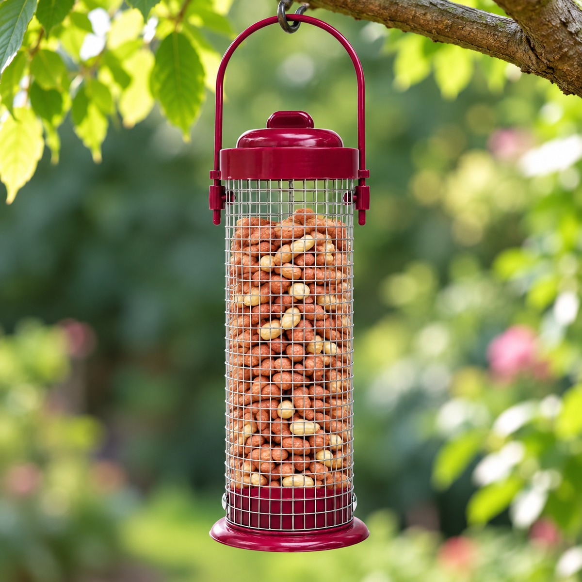 Kingfisher hanging nut feeder outdoors filled with illustrative peanuts, not included