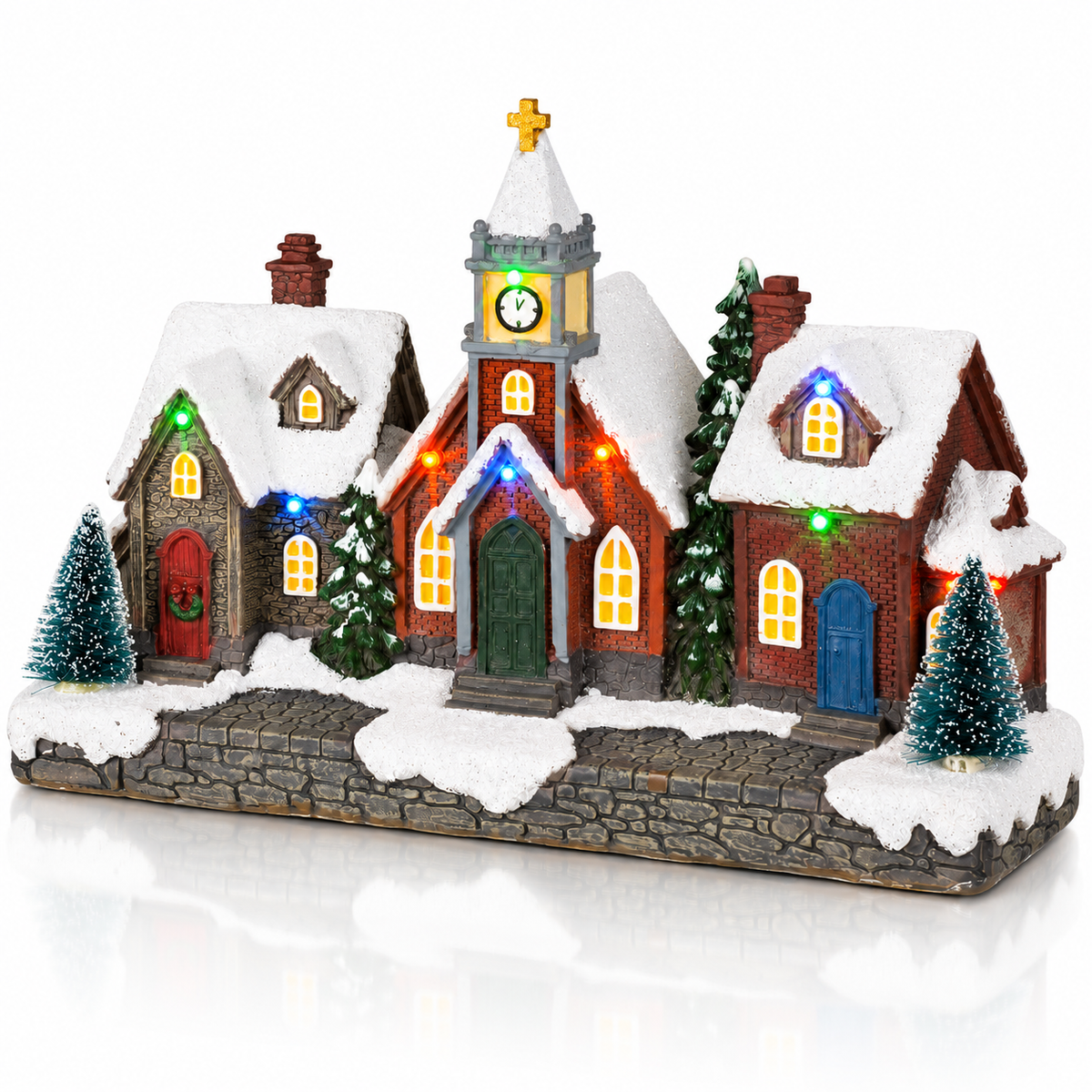 LED Christmas village street scene with houses and church angled view