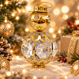Gold crystal snowman ornament in a festive Christmas home display