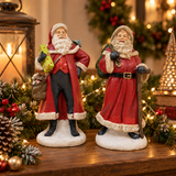 Pair of Premier 26cm red Santa Christmas ornaments in a seasonal display
