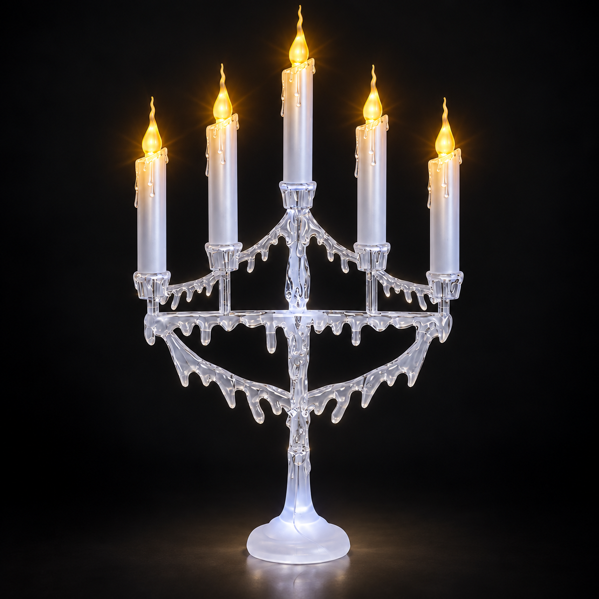 Close-up of white five-candle flickering LED Christmas candelabra