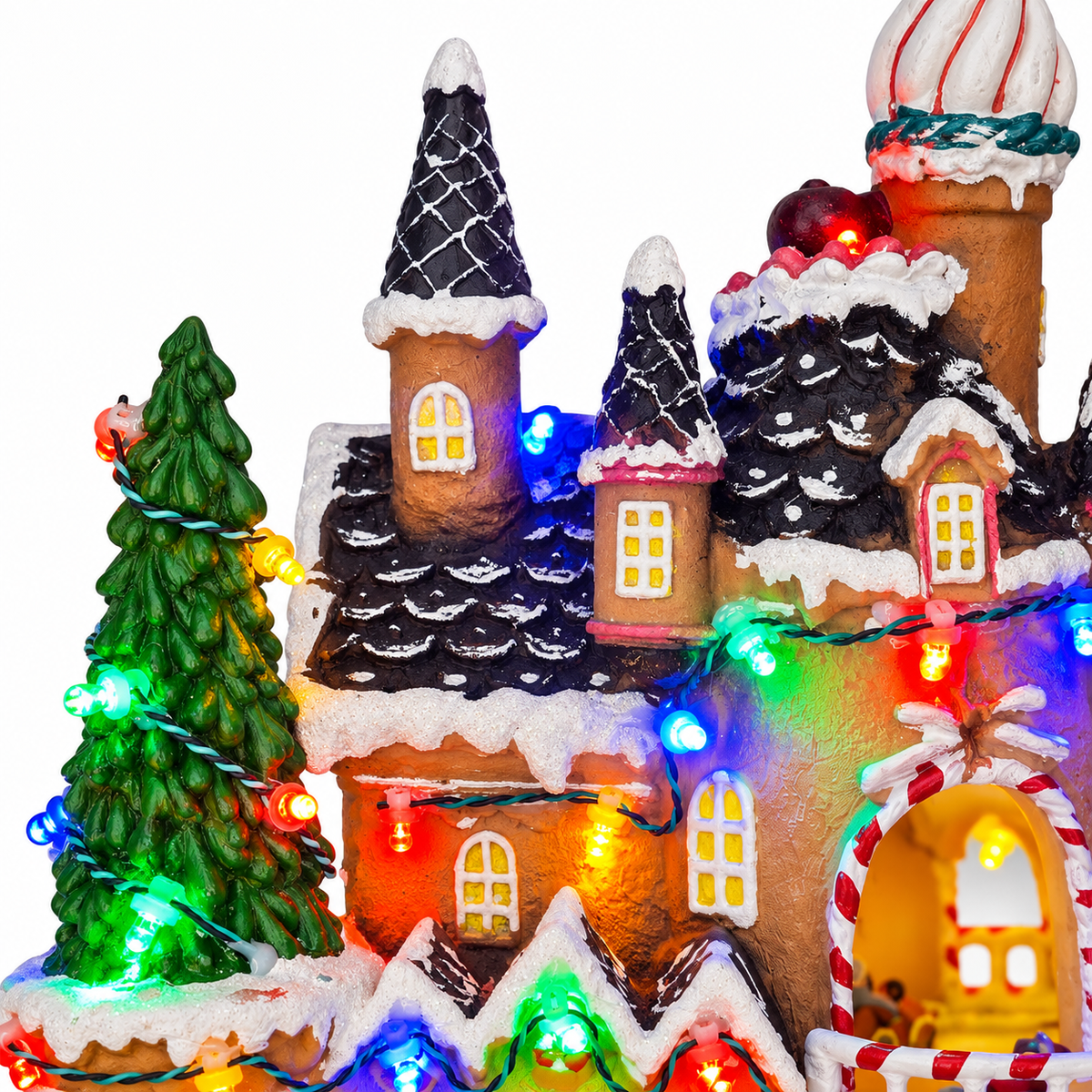 Widdop LED gingerbread house illuminated in a Christmas night display
