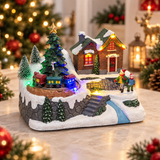 Widdop XM6602 musical snowy village with moving train in a Christmas display