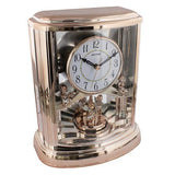 Rhythm rose gold musical mantel clock with rotating pendulum