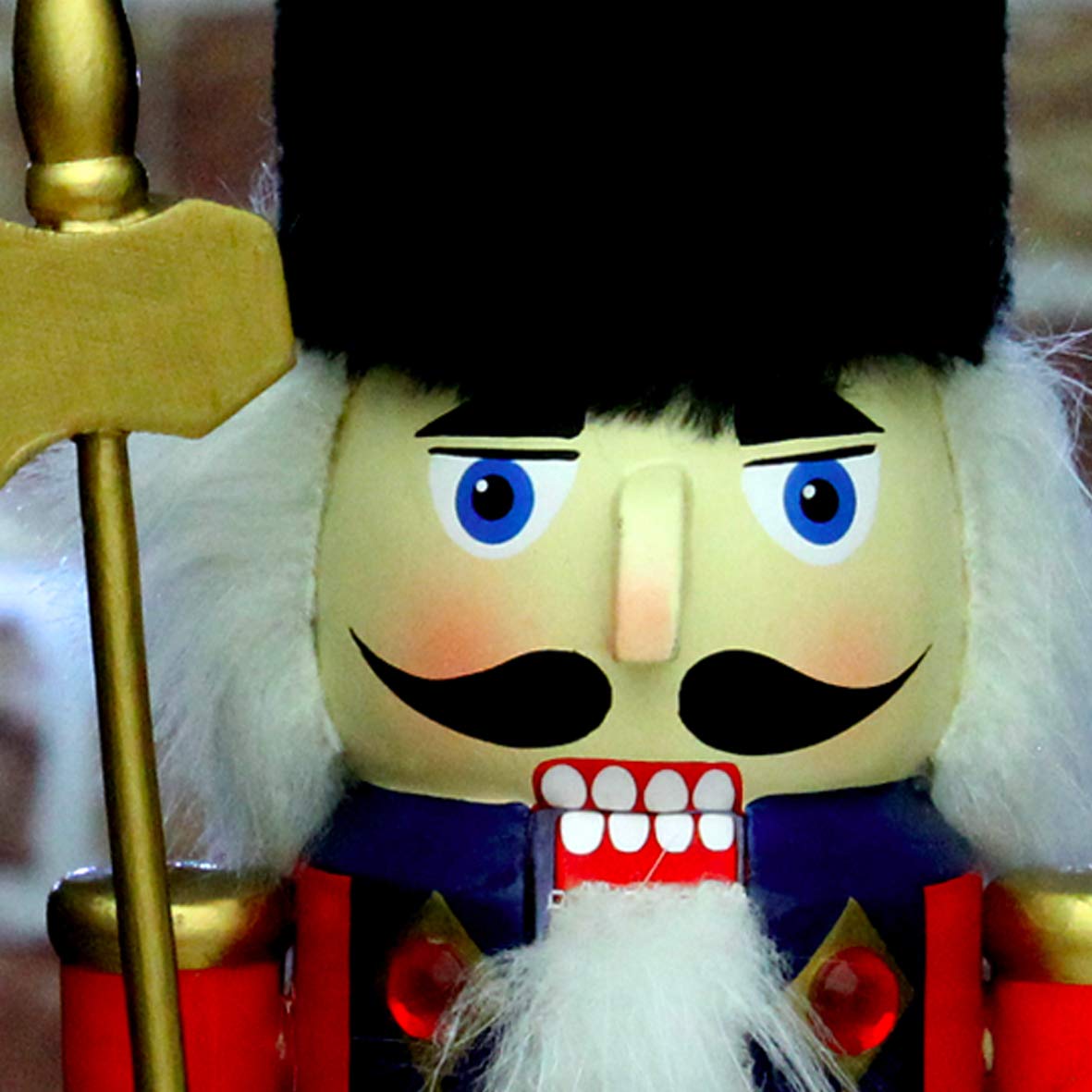 Red blue wooden nutcracker soldier festive ornament