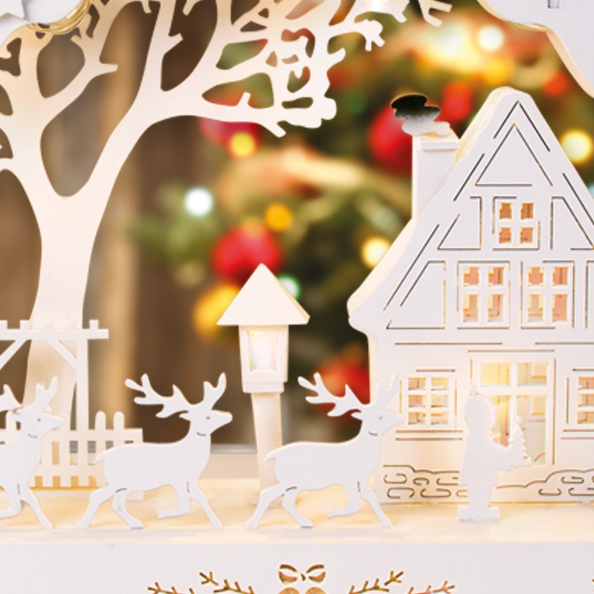 Christmas candle bridge with Santa and reindeer scene and warm white LEDs