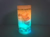 Premier LED Santa pillar candle with colour-changing flicker
