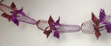 Festive red and purple foil garland ceiling decoration