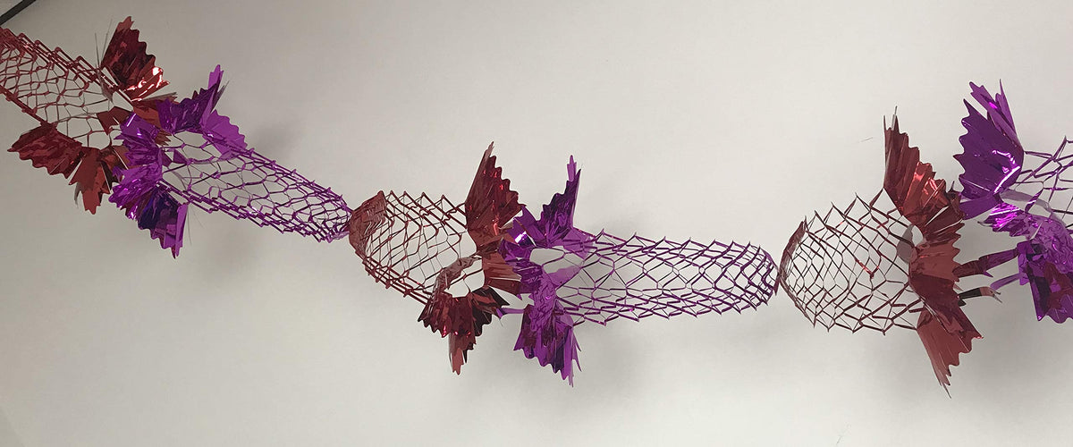 Festive red and purple foil garland ceiling decoration