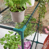 GardenKraft greenhouse with roll-up door and steel frame
