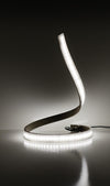 Satin nickel LED snake table lamp in showroom display
