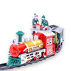 A charming Christmas toy train on tracks, accompanied by two elves, evoking a delightful and festive atmosphere.