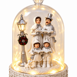 Christmas carol singers and lamppost detail inside clear cloche