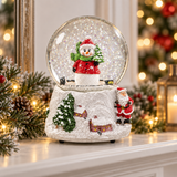 Close-up of the snowman scene inside the 15cm musical Christmas snow globe