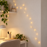 Warm white USB LED string lights in a cosy bedroom display