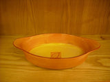 Brown oval ovenproof casserole baking dish with handles