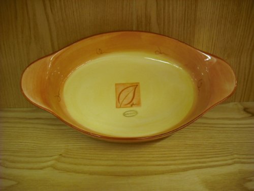 Brown oval ovenproof casserole baking dish with handles